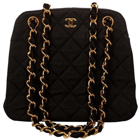 black quilted chanel bag with gold chain